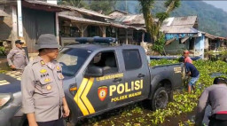 Polsek Mande Ajak Warga Bersihkan Eceng Gondok demi Pulihkan Fungsi Perairan Jangari